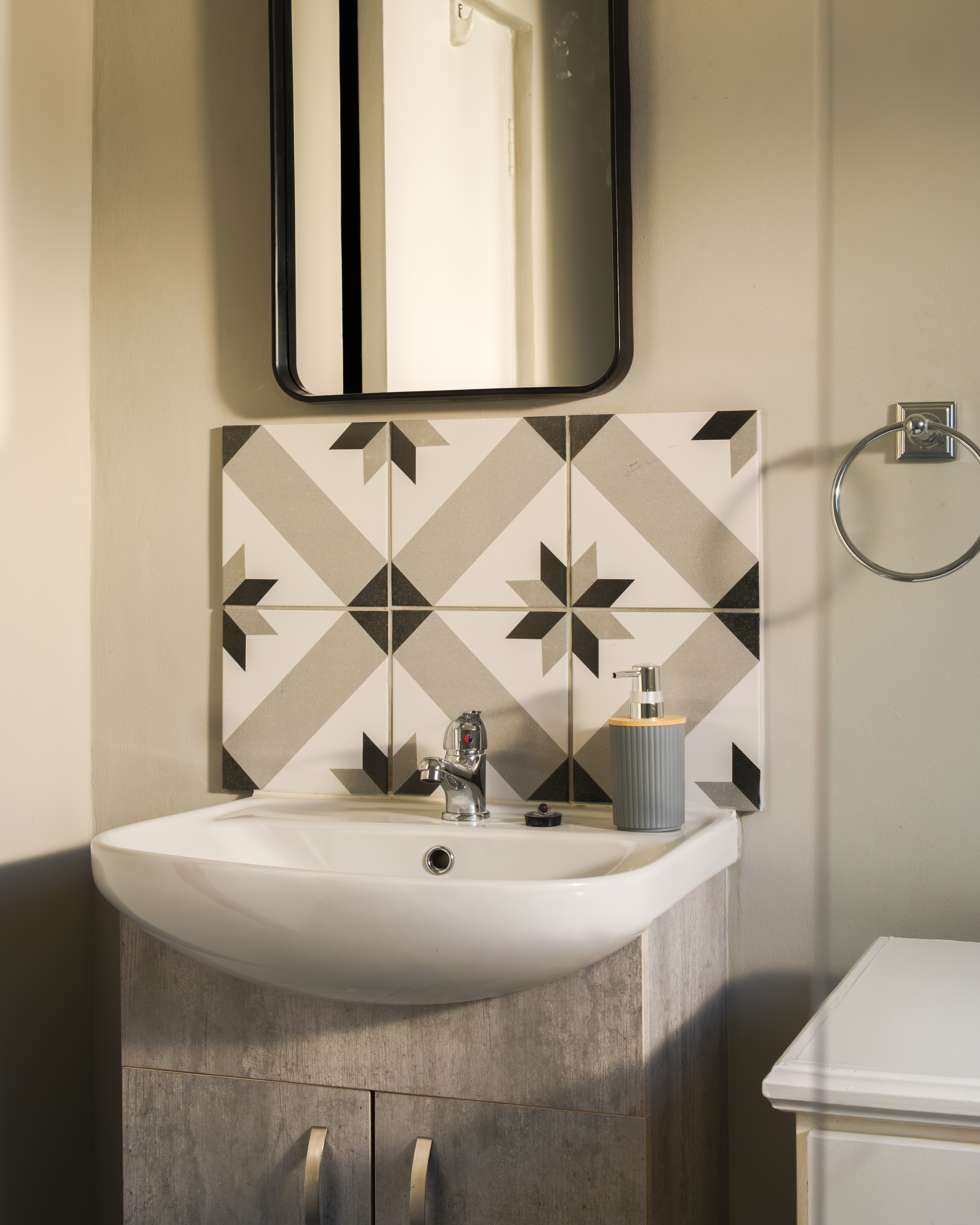 Bathroom with patterned tile
